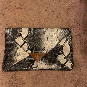 Faux snake skin clutch